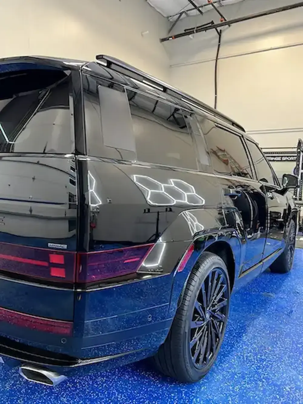 Black Range Rover with professional window tint installed at Slims Detailing Studio in Round Rock, TX.