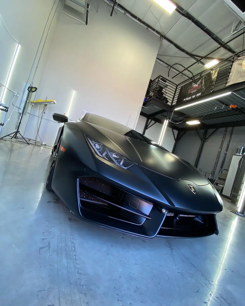 Matte black Lamborghini Huracán protected with ceramic coating at Slims Detailing Studio in Round Rock, TX.