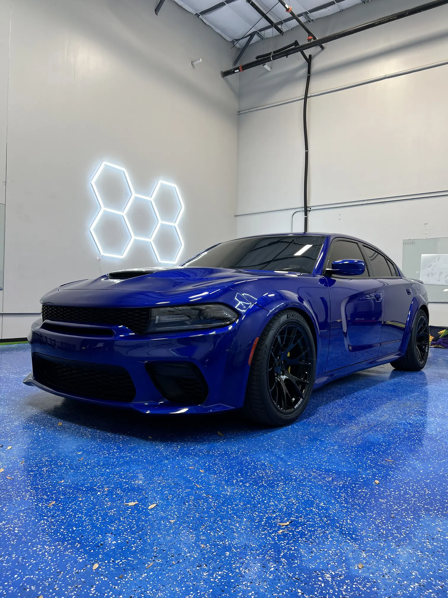 Deep blue performance sport sedan sealed with a hydrophobic GlossTechUSA ceramic coating in Georgetown TX